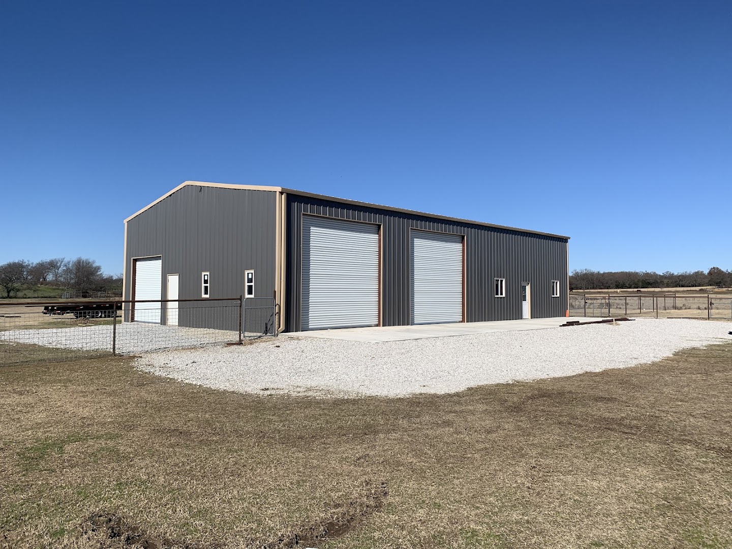 Large grey metal commercial building exterior